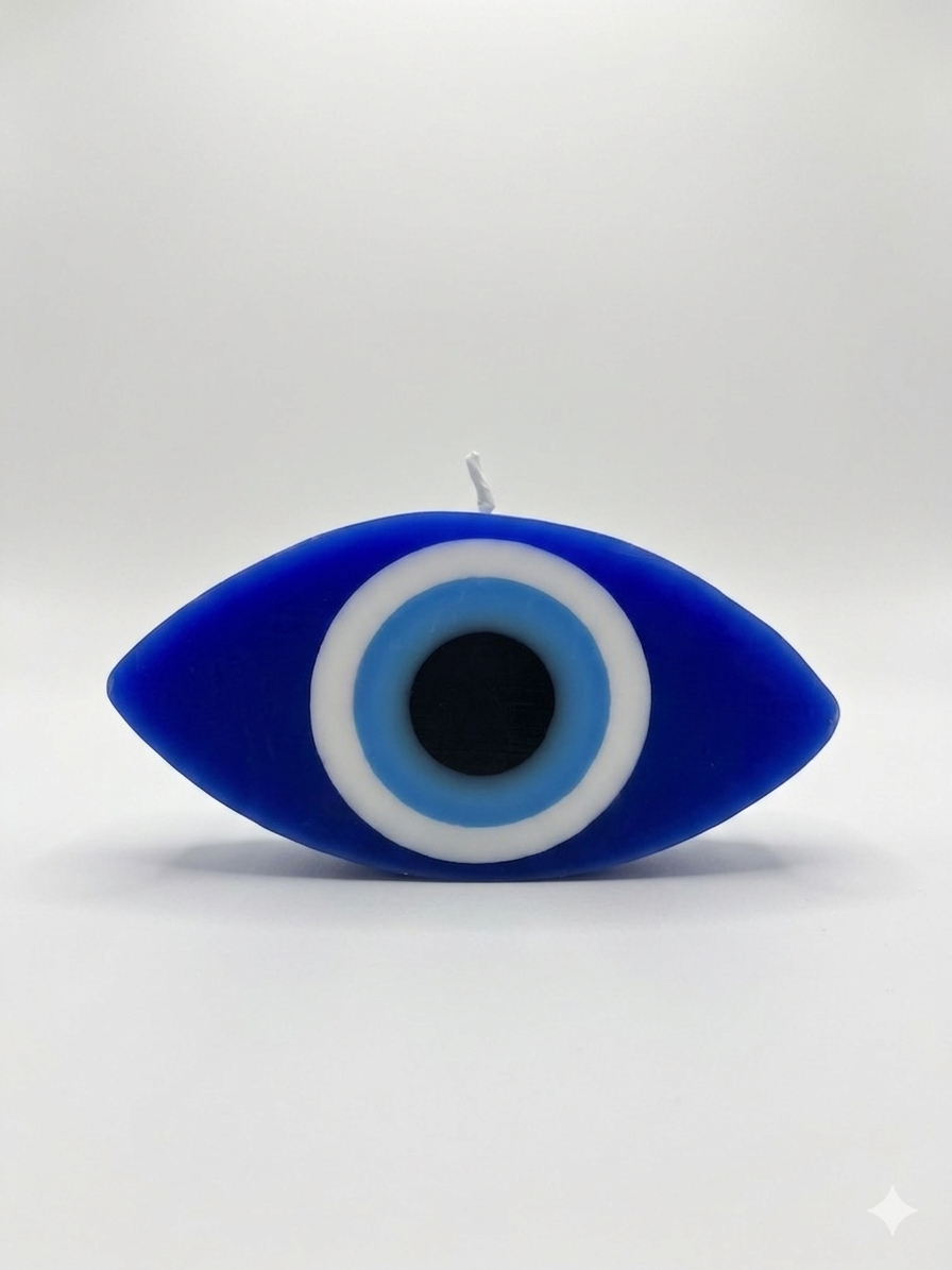 Blue eye-shaped candle on a white background