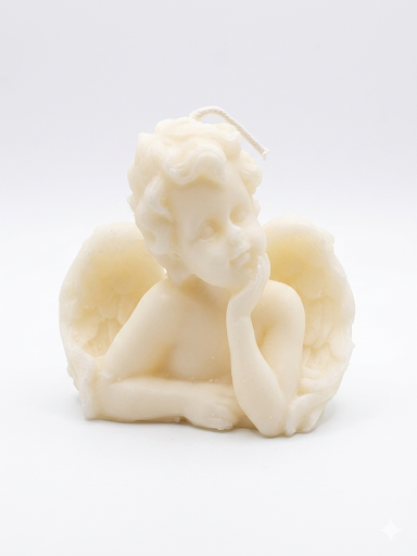 White ceramic sculpture of a cherub on a white background
